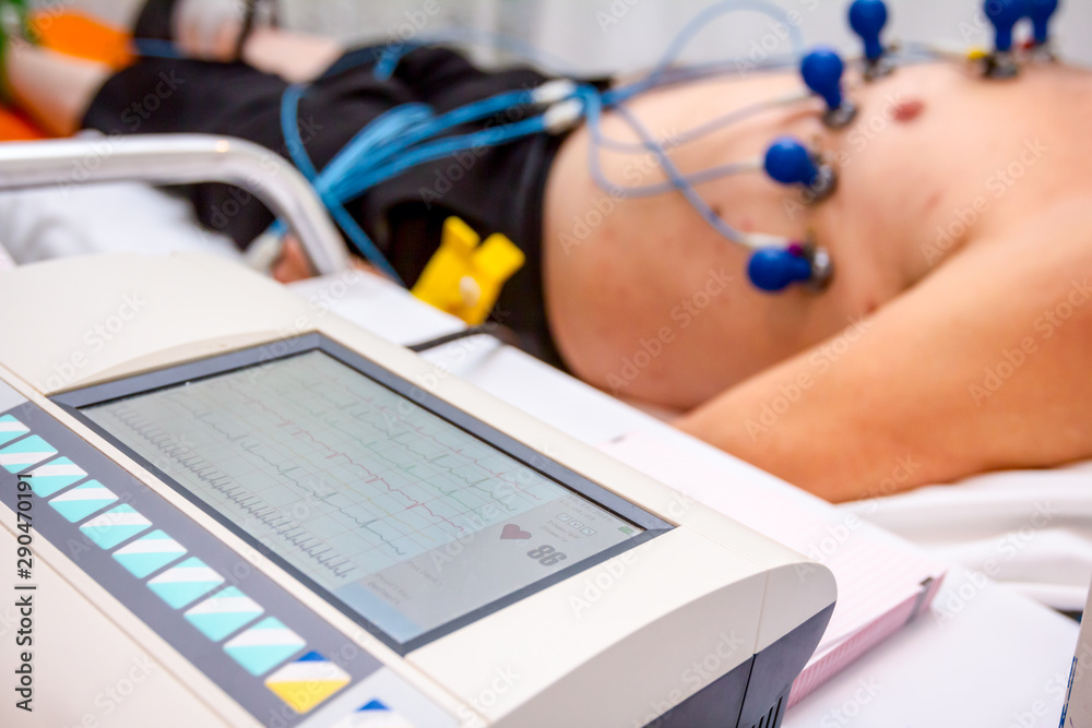 Older patient is under ECG or EKG test Stock Photo Adobe Stock