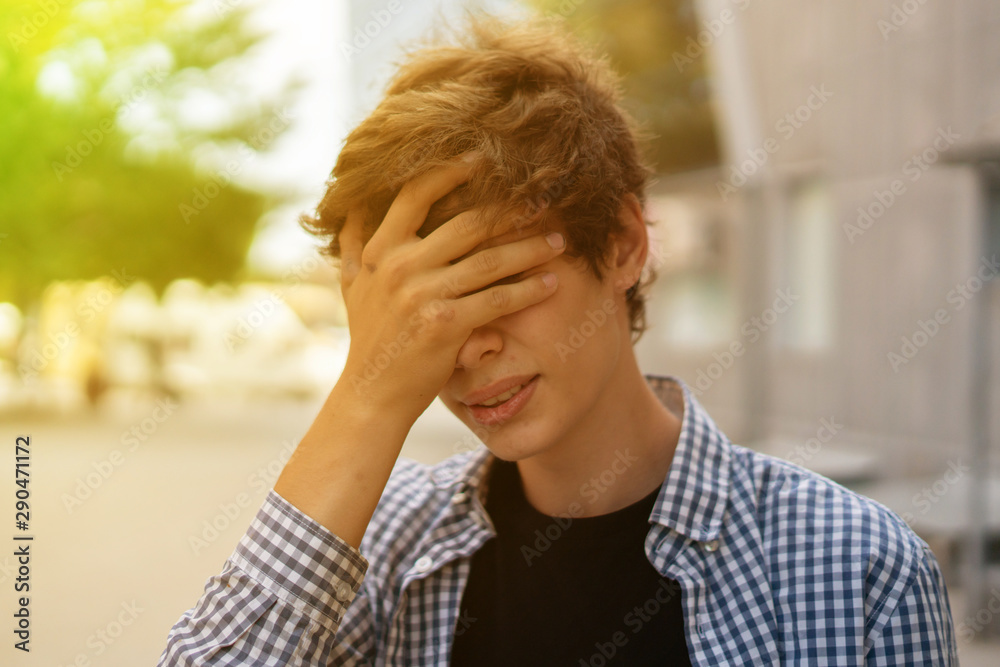 young man facepalm gesture emotion, frustrated man cover the face with hand