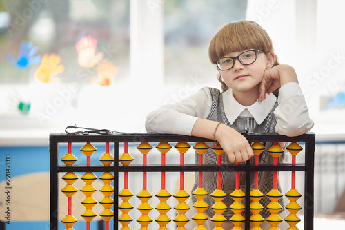 girl with glasses and abacus soroban