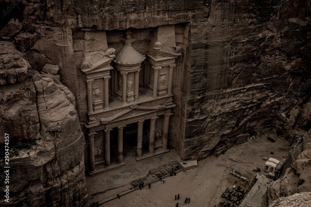 old style photography of Petra treasure world famous touristic heritage site on Jordan Middle East country ancient building exterior facade foreshortening from above in evening twilight time old style photography of Petra treasure world famous touristic heritage site on Jordan Middle East country ancient building exterior facade foreshortening from above in evening twilight time