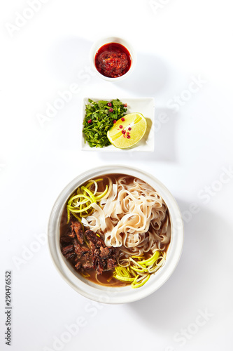 Traditional Vietnamese Soup Pho Bo with Beef Meat Isolated photo