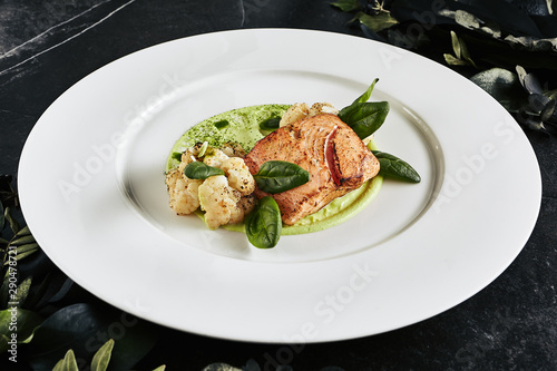 Restaurant Plate with Fillet of Salmon 48 Degrees, Green Peas Cream and Burnt Cauliflower
