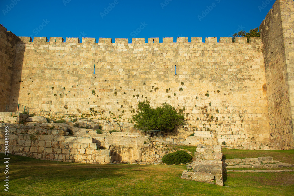 Jerusalem old city castle wall ancient protection building stone symmetry background textured object, UNESCO world famous heritage site 