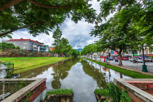 CHIANG MAI, THAILAND - Augustr 6, 2019:Tha Phae Gate Chiang Mai old town city and street ancient wall at moat (chang phuak gate) is a major tourist attraction in Chiang Mai Northern Thailand.