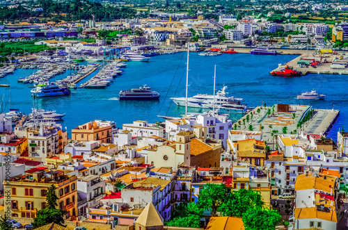 Ibiza Town. Ibiza.Spain . Panoramic view from the walls of the castle di Eivissa to the port of Ibiza and the ferry photo