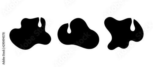 Set of black cow spots with milk drops. Rough doodle style vector illustration applicable for logo and package design.