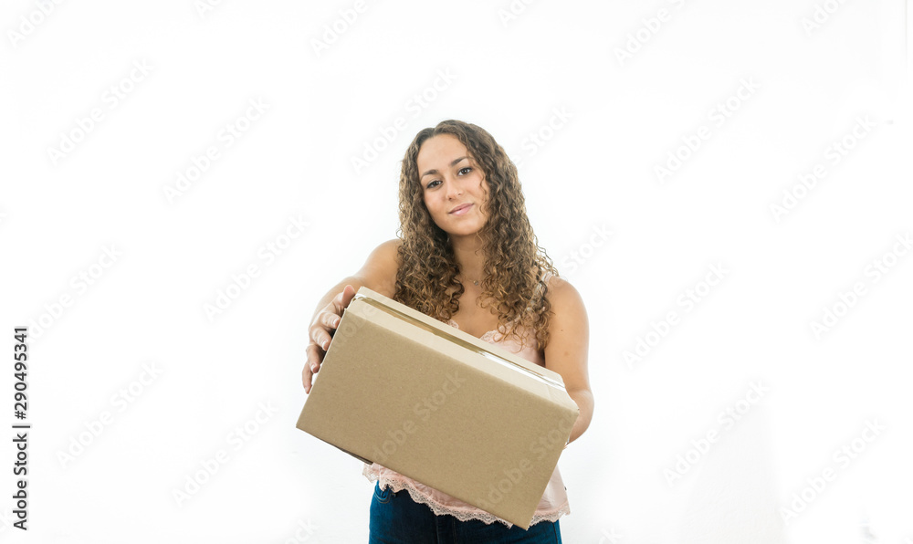 Girl delivering a box of cardboard