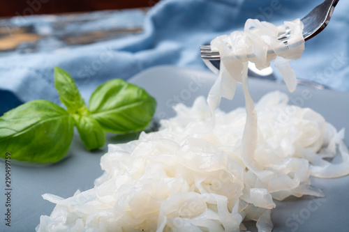 White konjac shirataki noodles, gluten free and no fat diet vegetarian and vegan Asian food photo