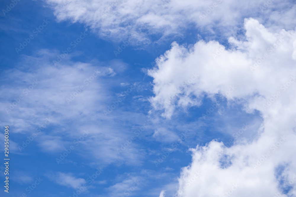 Bright blue sky there is a covering white clouds Bright blue sky there is a covering white clouds