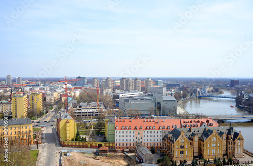 Wroclaw, Poland panoramic view over the river Odra with building sites and block of flats