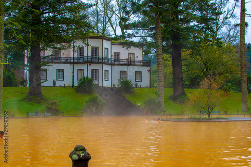 Hot water and natural sulfur pool in a garden in Furnas area, São Miguel Island, Azores photo