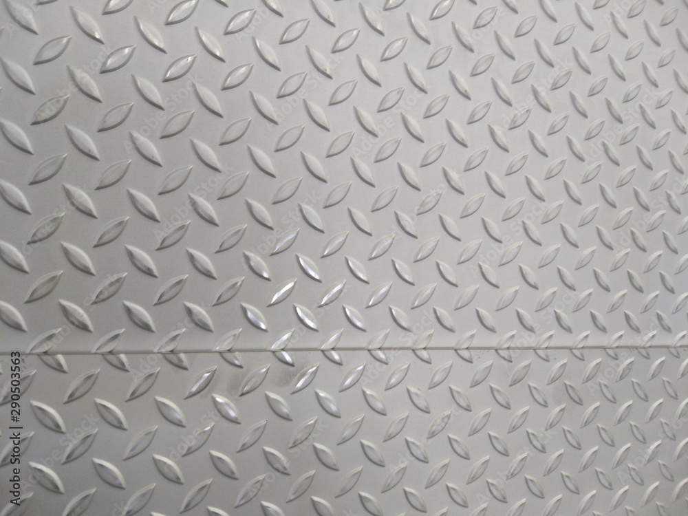 Laser cutting of stainless steel sheet, perforated steel for background.  Stock Photo | Adobe Stock