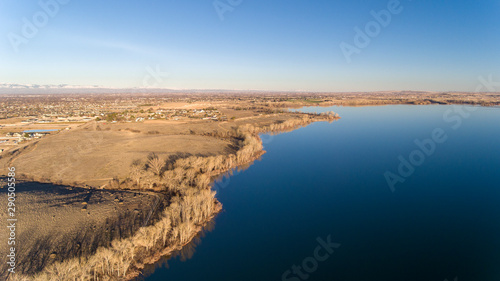 arial view of a lake in fall time