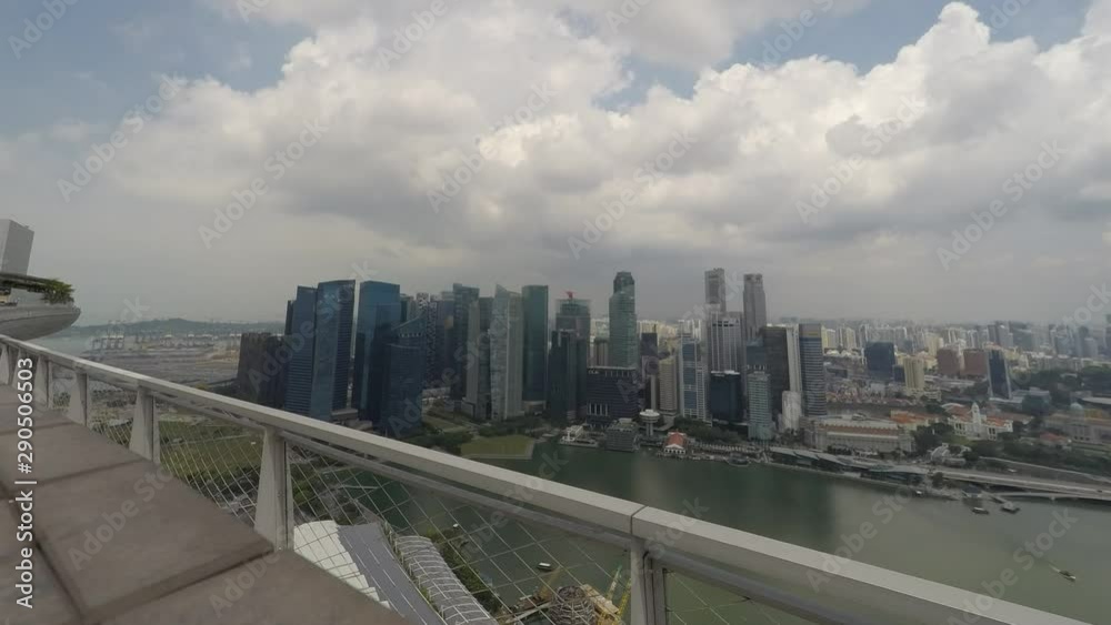 Time lapse of clouds passing over skyscrapers on Singapore skyline. Time lapse of clouds passing over skyscrapers on Singapore skyline.