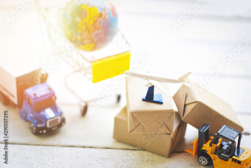 logistics transport import export shipping service Customers order things from via internet International shipping online Air courier Cargo plane boxes packaging freight forwarder to worldwid photo