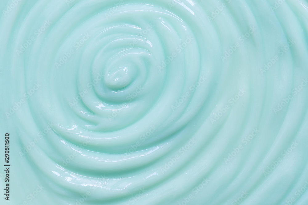 Texture of a moisturizing or cosmetic cream blue for the face or body. View from above. Texture of a moisturizing or cosmetic cream blue for the face or body. View from above.