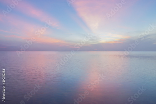 Beautiful sunrise sky over sea. © Wisarut