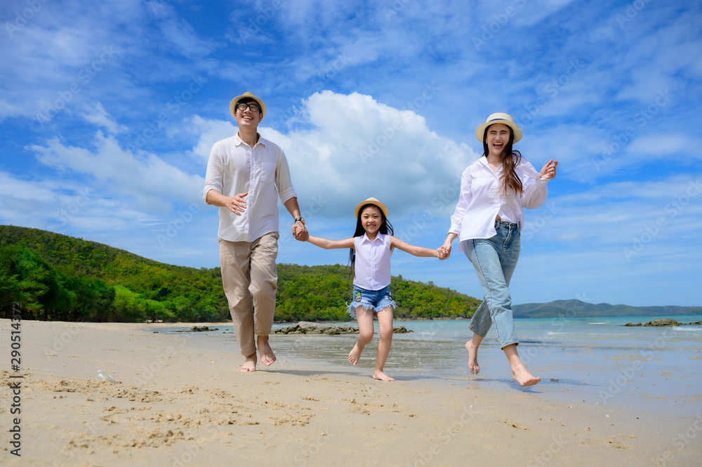 Group of happy family are enjoy trip of the sea beach together in vacation and long holidays.