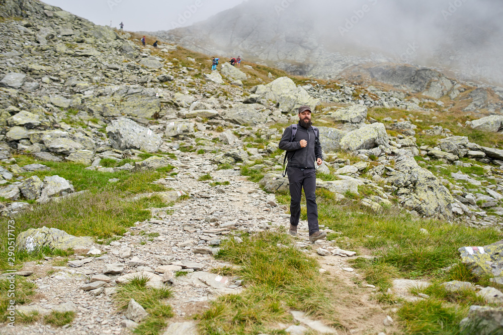 Man with backpack hiking