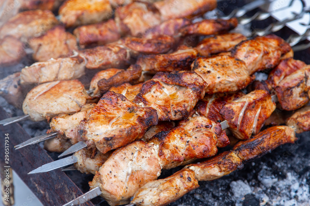 Barbecue skewers grilled on charcoal
