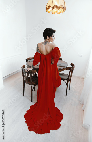 female with short haircut poses in Tbilisi loft