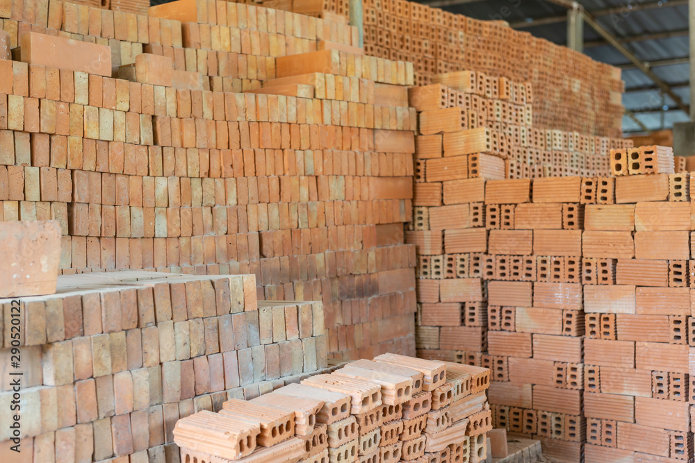 Obraz premium Brick piles placed on the factory floor.