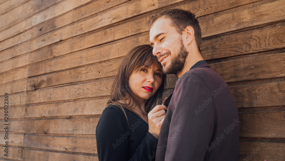 This is love. girl with guy posing on a wooden background. happy valentines day. summer vibes. couple relax outdoor. Couple relaxing enjoying each other. 