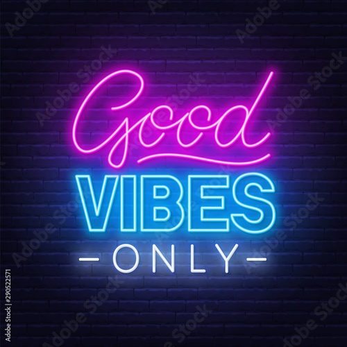 Neon sign good vibes only on a dark background.