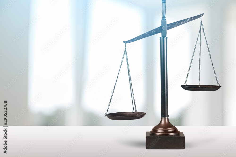 Justice Scales and books and wooden gavel on table. Justice concept Justice Scales and books and wooden gavel on table. Justice concept