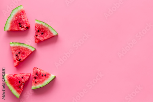 Popsicle from fresh watermelon on pink background top view space for text