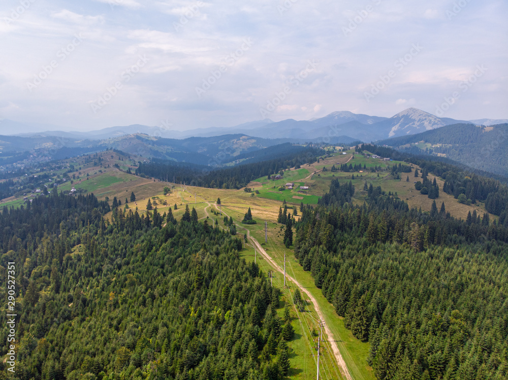 Inspirational aerial view on road in mountains Beautiful scene from above.