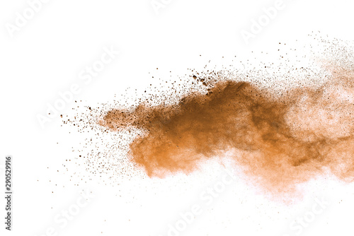 Explosion of brown powder on white background.  © piyaphong