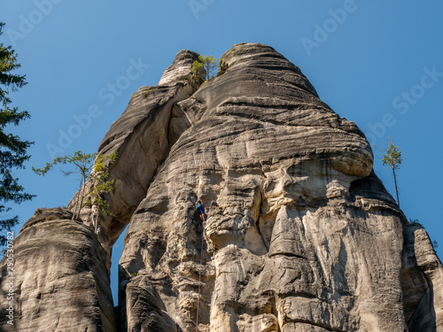 Climbers in rock town of Adrspach. Adrspach National Park in northeastern Bohemia  Czech Republic  Europe.