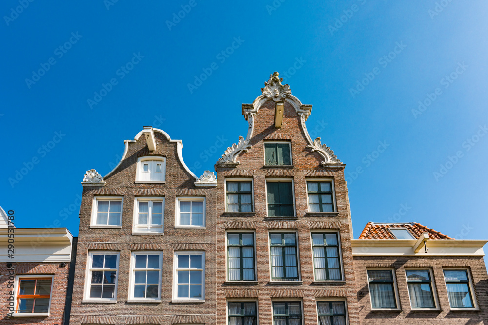 gable houses in street Haarlemmerstraat in Amsterdam, The Netherlands