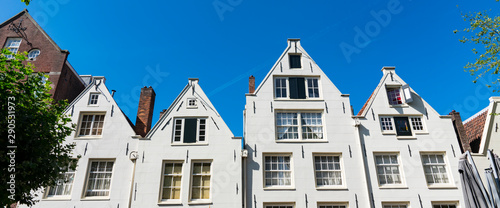 White houses in street Spui in Amsterdam, The Netherlands photo