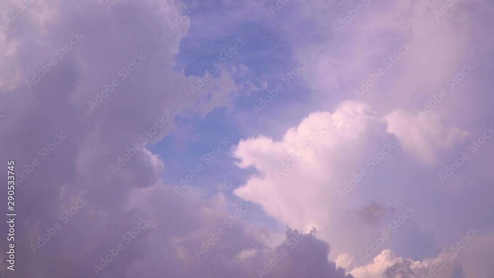 Pink rain clouds as time lapse at the sunset Pink rain clouds as time lapse at the sunset