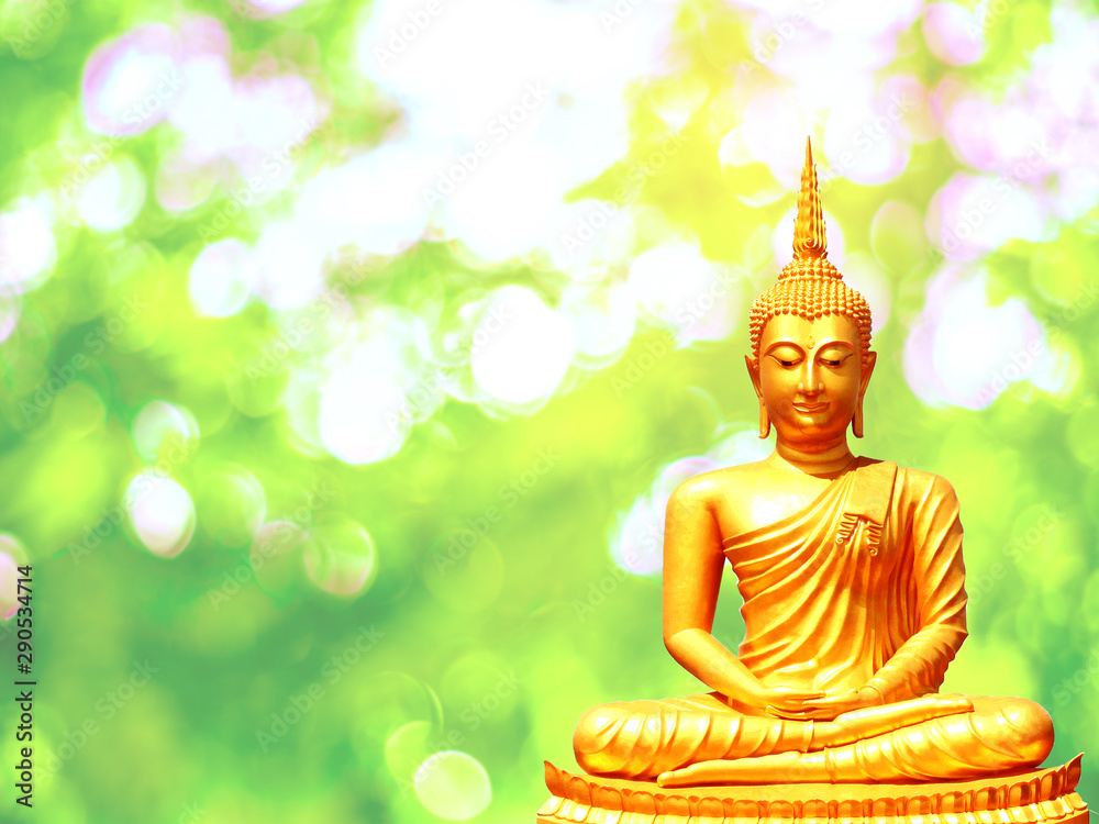 Obraz premium Buddha statue with aura on yellow sky background