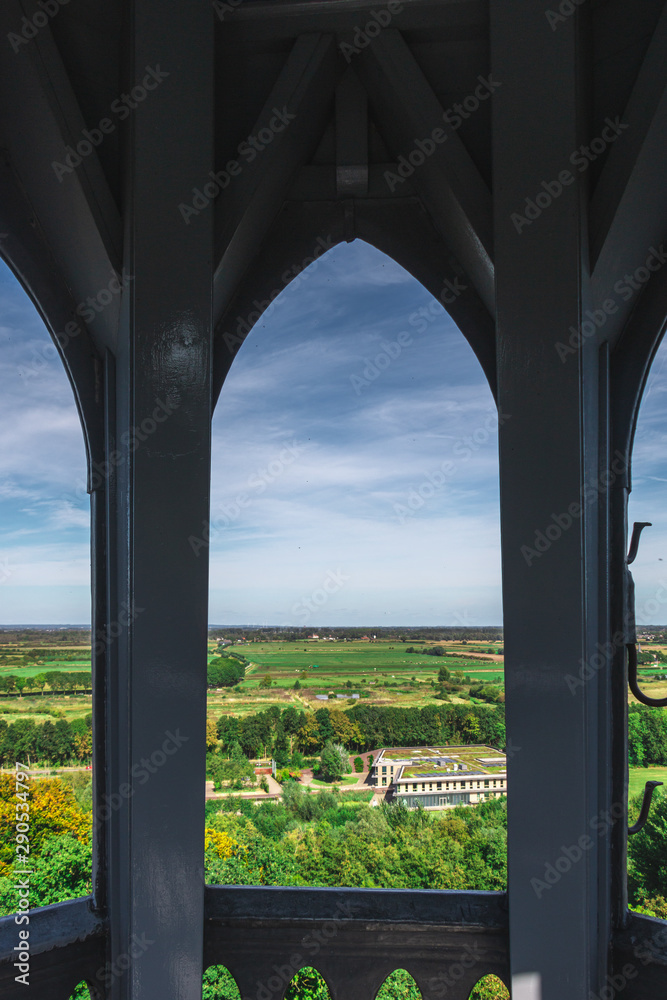 view through church window Dutch landscape