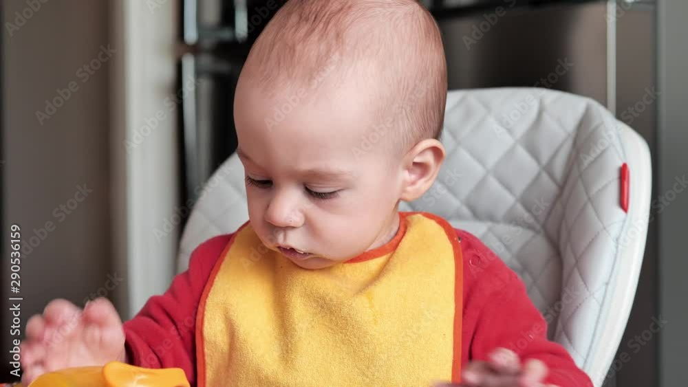 Slow motion, Little baby boy drinks water from bottle
