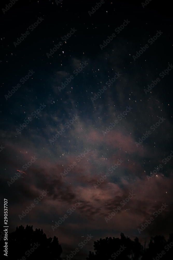night sky with stars and clouds