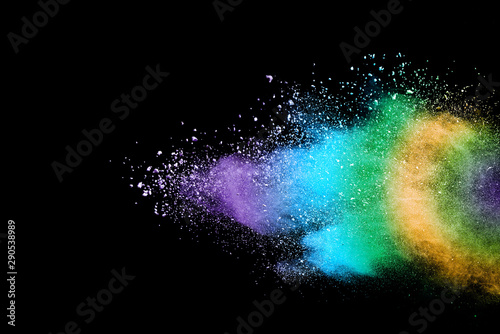 abstract colored dust explosion on a black background.abstract powder splatted background,Freeze motion of color powder exploding/throwing color powder, multicolored glitter texture.