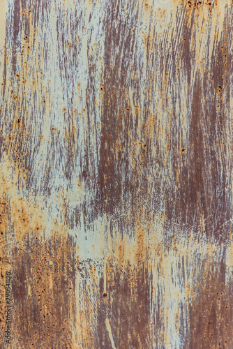 texture of rusty painted metal. several layers of paint. corrosion of metal