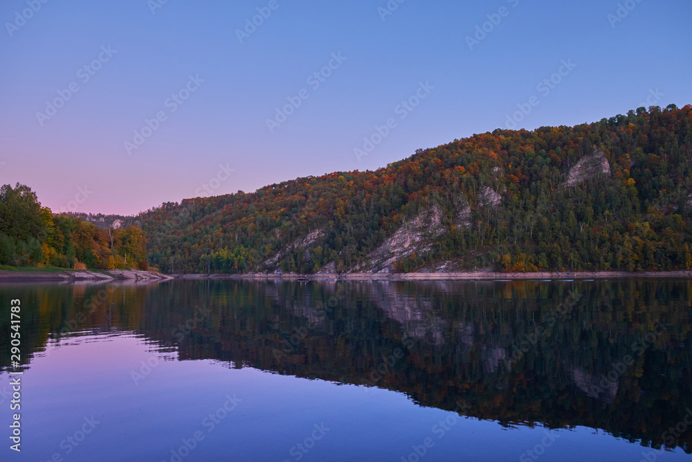 Autumn landscape of lake and mountains at sunset. Sweden