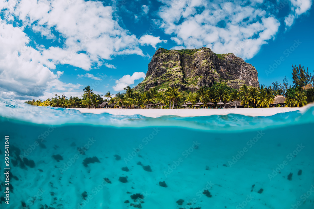 Tropical crystal ocean with Le Morne mountain and luxury beach in Mauritius. Split view. - obrazy, fototapety, plakaty 