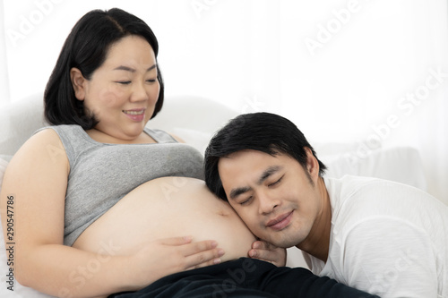 pregnant husband and wife health care concept