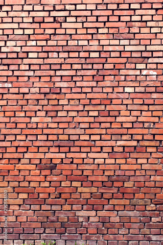 Red bricks background. A part of wall of the building