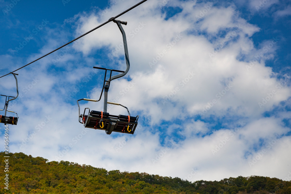 Funicular in the mountains. Summer mountains and cable car. Funicular in the mountains. Summer mountains and cable car.