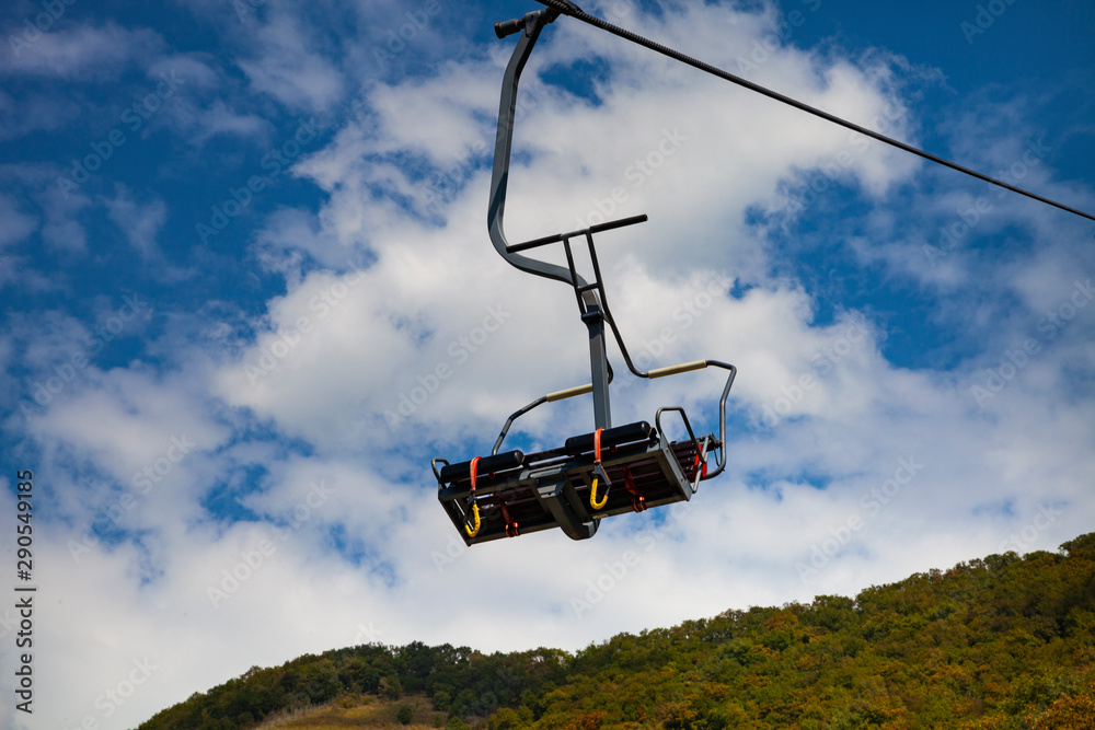 Funicular in the mountains. Summer mountains and cable car. Funicular in the mountains. Summer mountains and cable car.