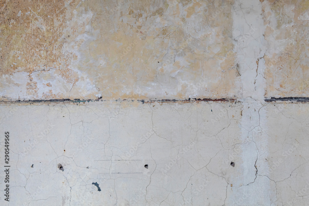 Obraz premium Old Weathered Cracked White Painted Wall Texture
