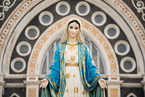 The Blessed Virgin Mary,mother of Jesus on the blue sky, in front of the Roman Catholic Diocese, public place in Chanthaburi, Thailand.